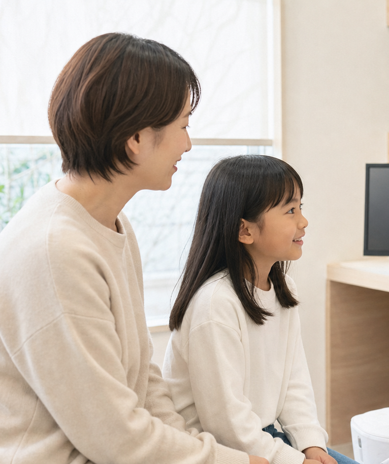 お子様を中心にした親子の歯科相談イメージ